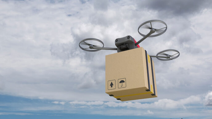 Un dron llevando un paquete