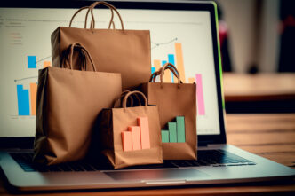 Bolsas de la compra sobre un ordenador con estadísticas.